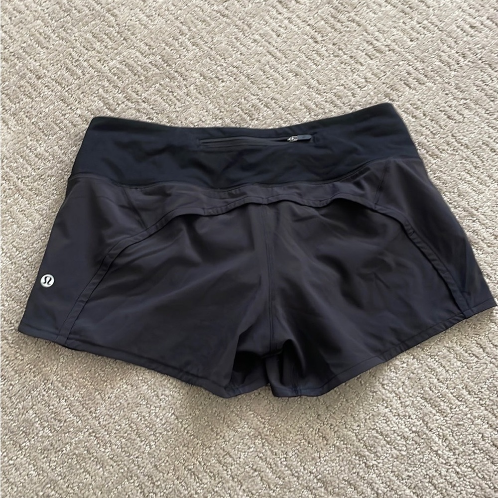 Lululemon black speed it up sports 4”